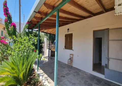 East Mani property, Greek coastal home, house for sale East Mani, seaside village house, Greek village property, detached house Greece, property near Gytheio, holiday home Greece, beach house East Mani, Greek property with veranda, house with fireplace Greece, authentic Greek living, property near Areopolis, coastal property Greece, Greek island lifestyle, property with storage room Greece, Mediterranean home for sale, Greek property investment, sea view property Greece.