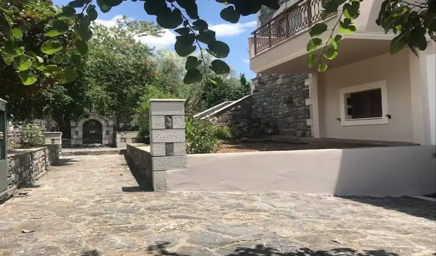 stone house for sale Greece, traditional home Gytheio, property in Konakia, house with mountain views, house with garden Peloponnese, two-storey house Greece, house with BBQ area, semi-finished property Gytheio, Greek village home, house with verandas and balconies, year-round living Greece, property near Gytheio, real estate Peloponnese, holiday home Greece, property with air conditioning and heating, house with water cistern