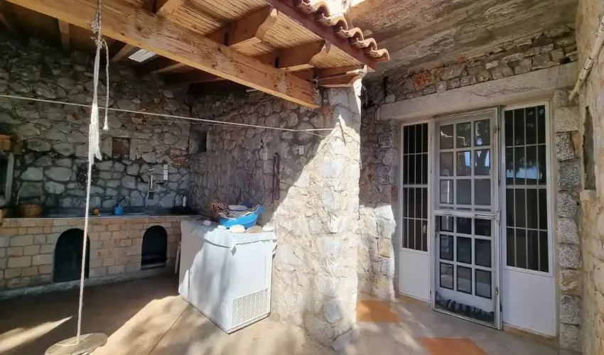 East Mani property for sale, stone house Peloponnese, sea view house Greece, traditional Mani home, rural property Greece, Greek house with land, guest house Mani, property with olive trees, house with BBQ area, secluded house Greece, real estate East Mani, house near Areopoli, Peloponnese retreat, Greek coastal property, tranquil Greek home