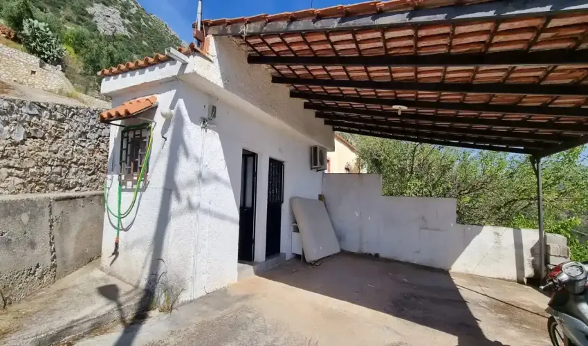 East Mani property for sale, stone house Peloponnese, sea view house Greece, traditional Mani home, rural property Greece, Greek house with land, guest house Mani, property with olive trees, house with BBQ area, secluded house Greece, real estate East Mani, house near Areopoli, Peloponnese retreat, Greek coastal property, tranquil Greek home
