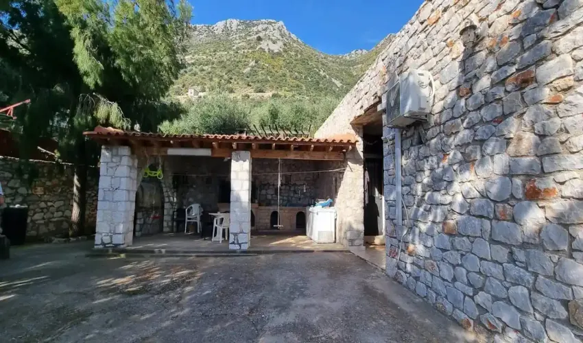 East Mani property for sale, stone house Peloponnese, sea view house Greece, traditional Mani home, rural property Greece, Greek house with land, guest house Mani, property with olive trees, house with BBQ area, secluded house Greece, real estate East Mani, house near Areopoli, Peloponnese retreat, Greek coastal property, tranquil Greek home
