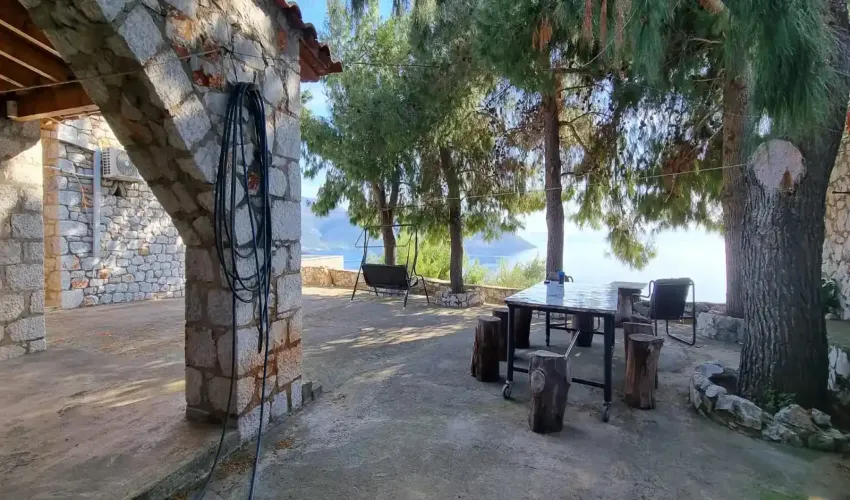 East Mani property for sale, stone house Peloponnese, sea view house Greece, traditional Mani home, rural property Greece, Greek house with land, guest house Mani, property with olive trees, house with BBQ area, secluded house Greece, real estate East Mani, house near Areopoli, Peloponnese retreat, Greek coastal property, tranquil Greek home