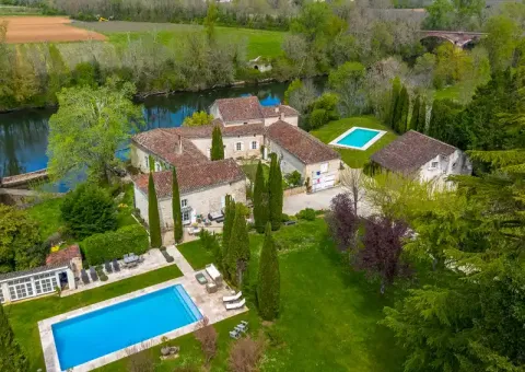 riverside estate, French property, luxury home, Vire-sur-Lot, property with land, gîte complex, chambres d’hôtes, estate with pools, tennis court, historic home, 18th-century estate, Lot Valley, guesthouse, French retreat, wellness property, boutique estate, investment property, multi-generational home, stone property, prestige property
