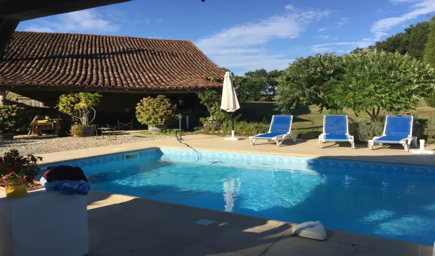 rural estate, property with land, Civray, Vienne, two homes, gîte, holiday rental potential, lake, woodland, pasture, swimming pool, barns, outbuildings, private location, no near neighbours, multi-generational living, French countryside property, income potential