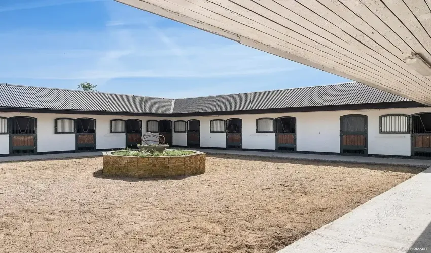 equestrian property Sweden, equestrian estate Skåne, horse farm Sweden, professional equestrian facility, indoor arena Sweden, riding arena Sweden, equestrian business for sale, horse property with income, rural property Skåne, Linderöd property for sale, Swedish horse farm, property with stables Sweden, equestrian training facility Europe